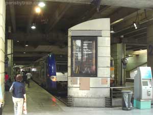 Gare Montparnasse Train platform destination stops sign