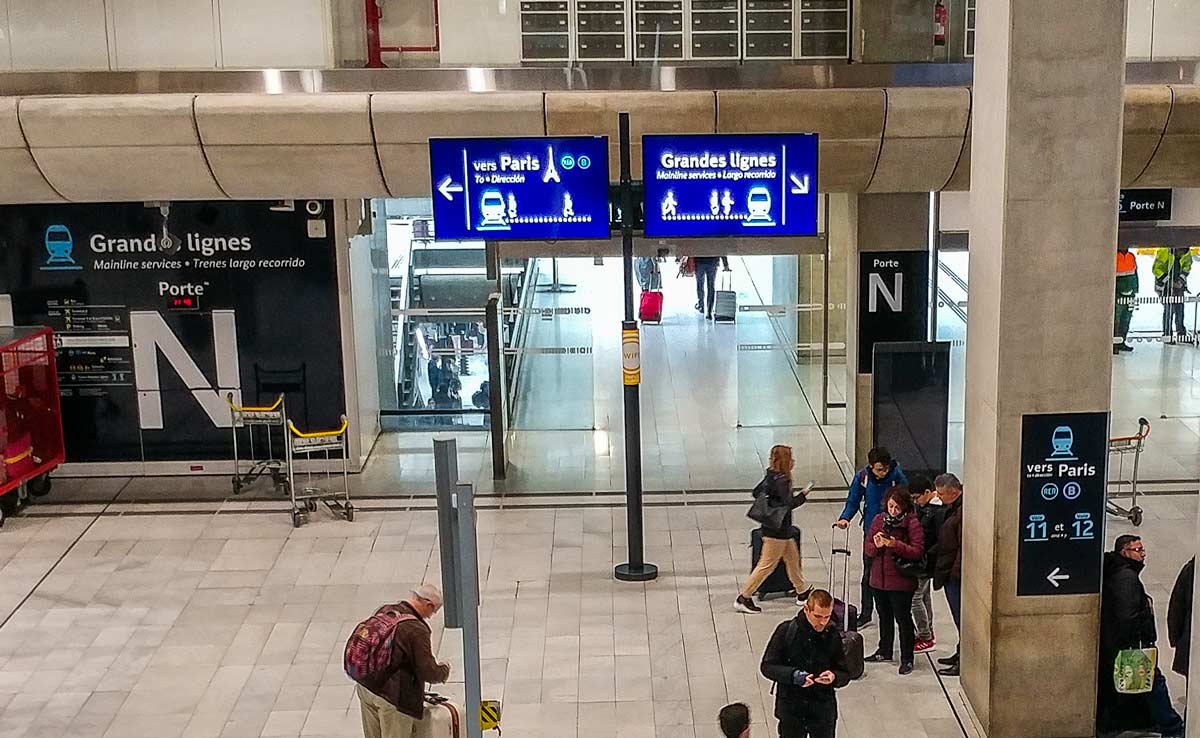 CDG Terminal 2 train station signs for RER Paris trains and TGV Grandes Lignes
